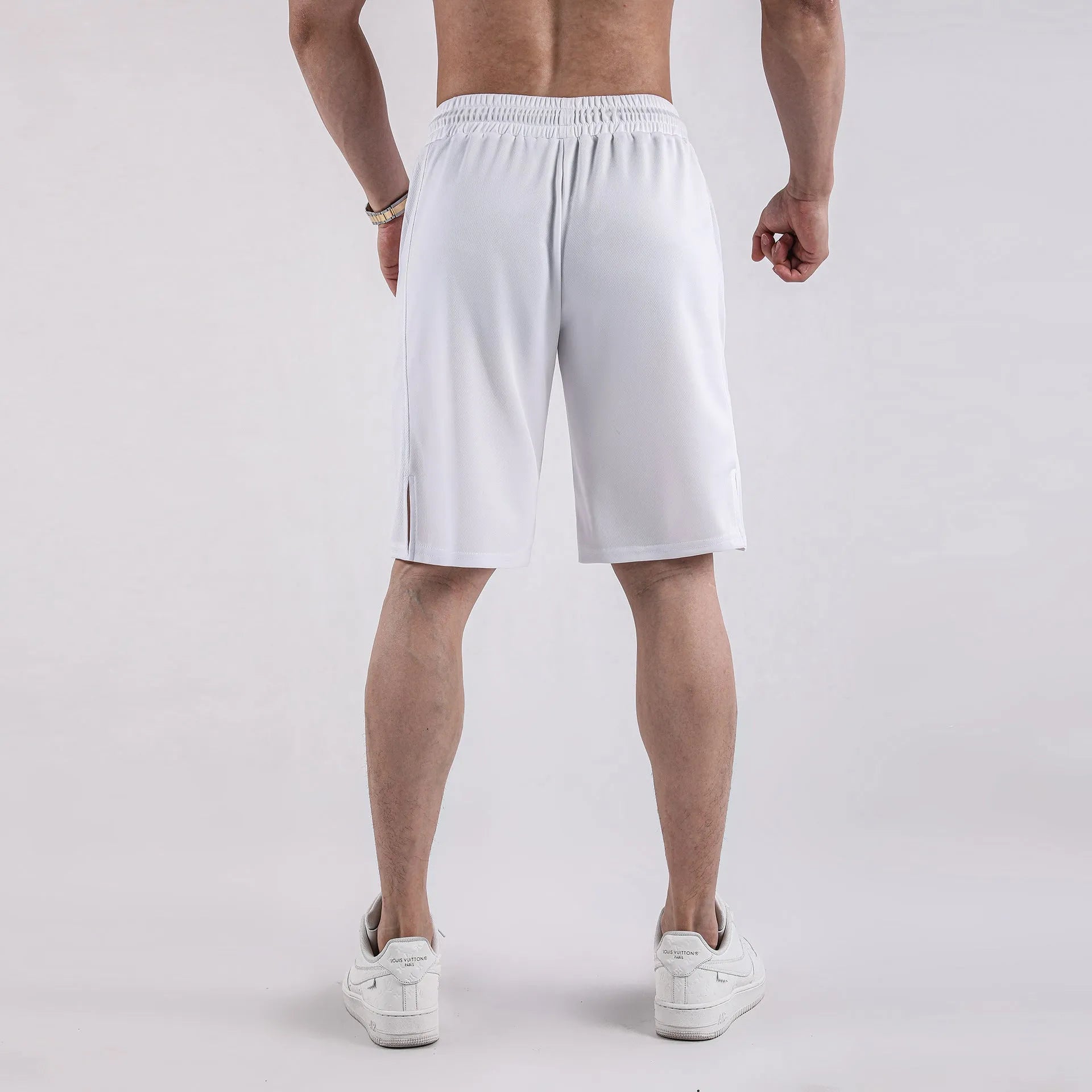 Men's black quick-drying mesh shorts with elastic waistband and loose fit for sports casual wear