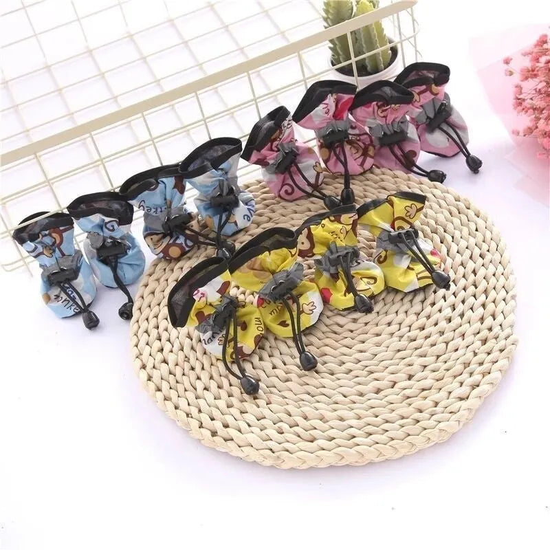 Pet dog four seasons breathable soft bottom non-slip cloth shoes in multiple colours and sizes on a white background.
