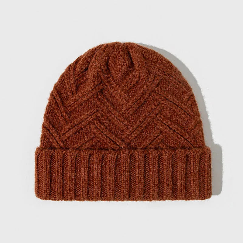 Women's wool knitted dome crown hat with totem pattern in seasonal colours