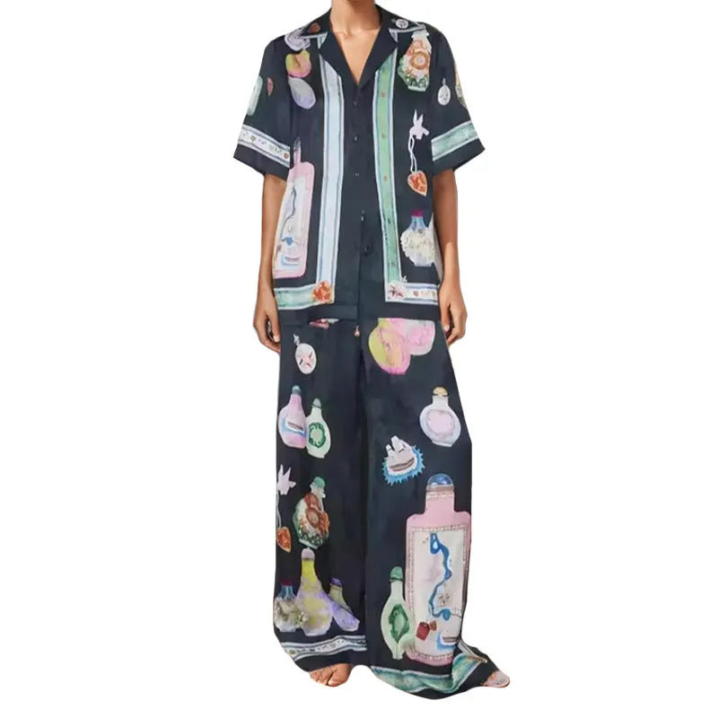 Black women's casual set with cartoon print, featuring a cardigan and trousers