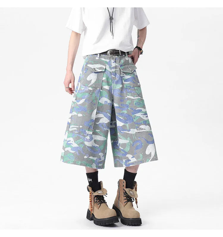 Men's camouflage cotton work trousers with straight leg and cropped length showing utility pockets