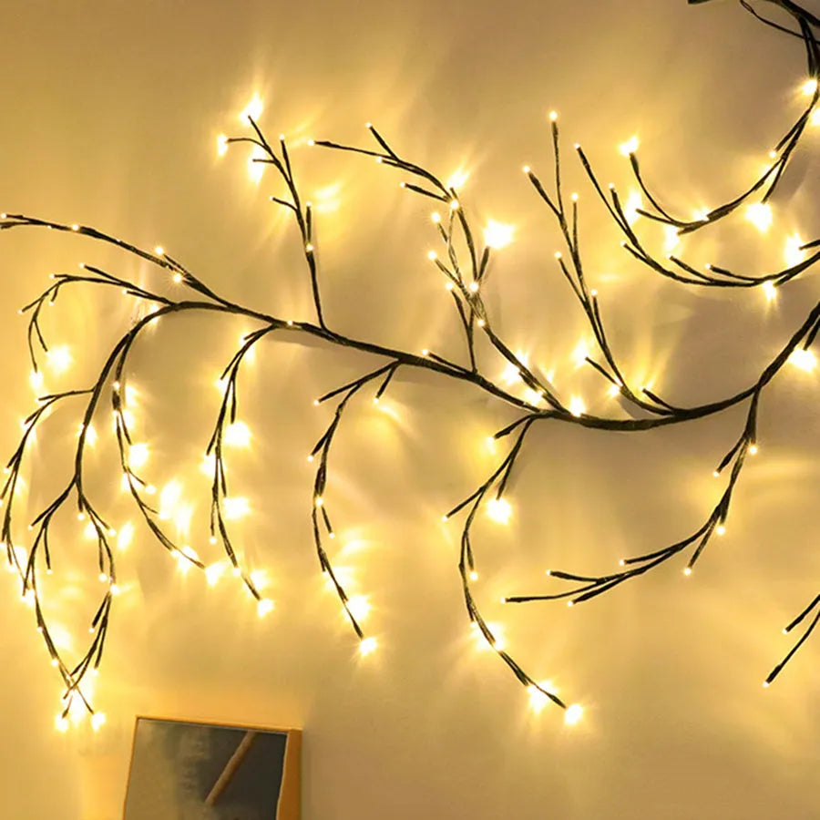 Flexible 2.3m vine light garland with 144 warm white LEDs and birch bark texture on a wall