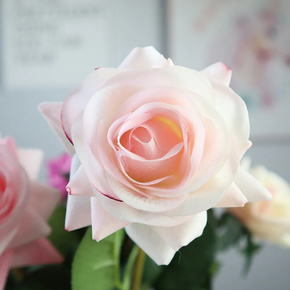 Artificial silk flower bouquet measuring approximately 42cm long with 8.5cm flower heads in multiple colour options