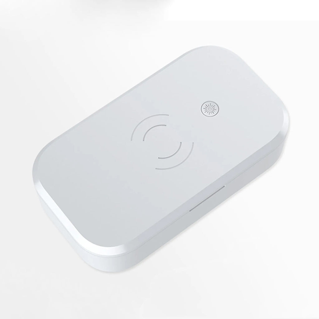 A white ultraviolet disinfection box with wireless phone charging function and USB cable.