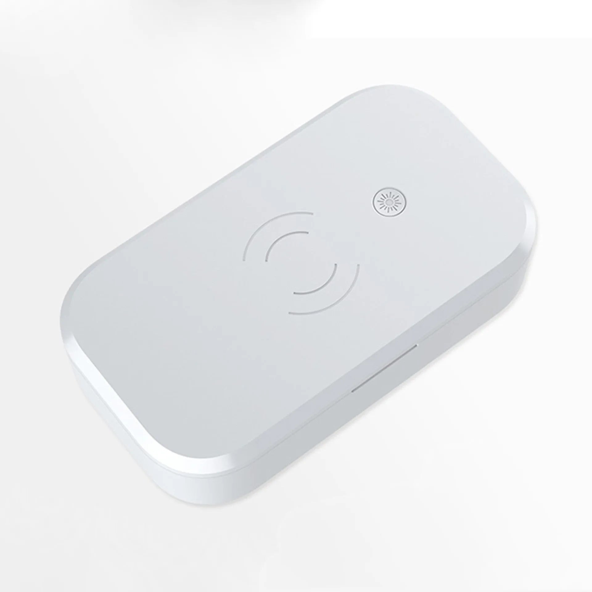 A white ultraviolet disinfection box with wireless phone charging function and USB cable.