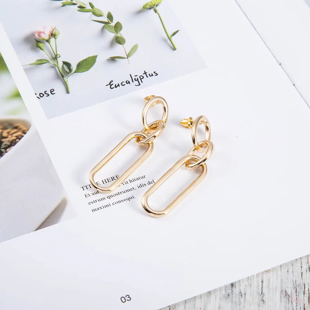 Geometric sterling silver needle coloured women's hoop earrings with ring and line design