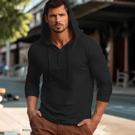 Men's dark blue cotton sports hoodie pullover with long sleeves on a hanger