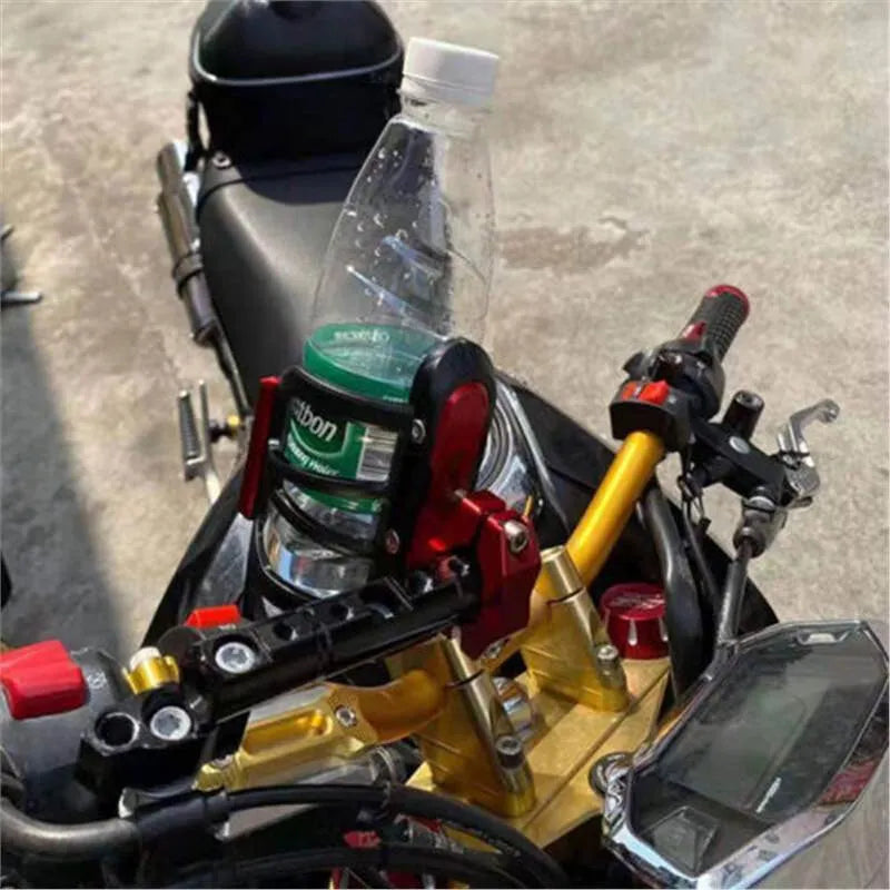 Water bottle cage mounted on Honda X-ADV scooter bumper in selected colour