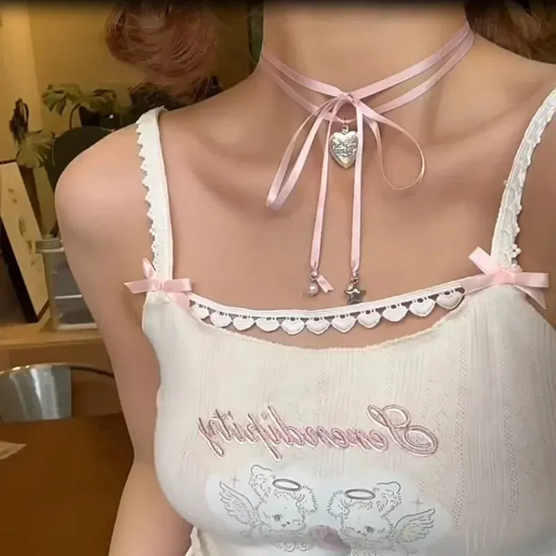 Women's alloy ribbon love pendant fashion necklace on a clavicle chain, available in 33 colours.