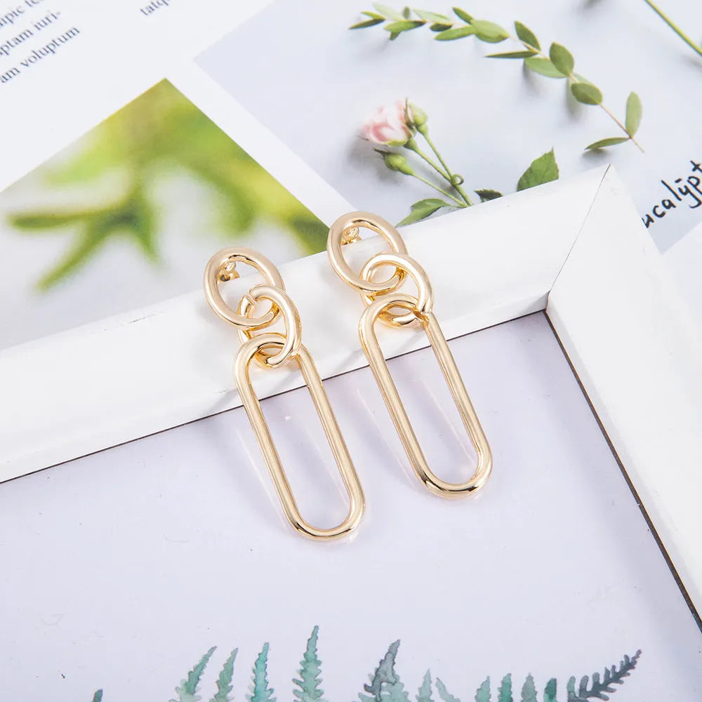 Geometric sterling silver needle coloured women's hoop earrings with ring and line design