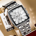Square faced men's business watch with stainless steel strap on a wrist, showing a gold and blue colour variant.