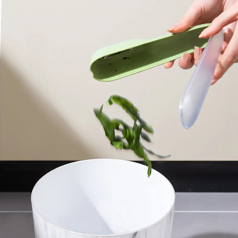 Storage type peeling knife with tube, stainless steel blade, non-slip plastic handle, 20 x 4.8cm, dark green and light green colours