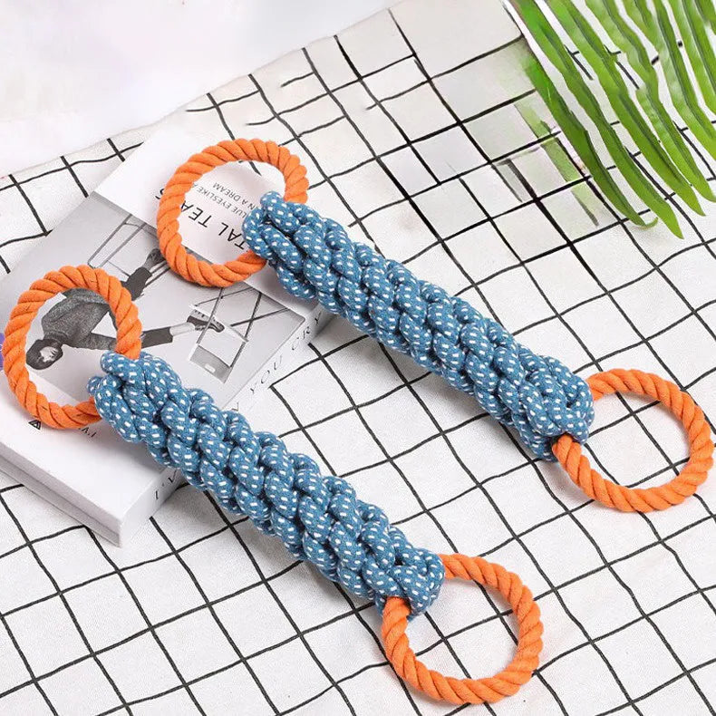 Blue braided cotton double-ring dog teething toy on white background