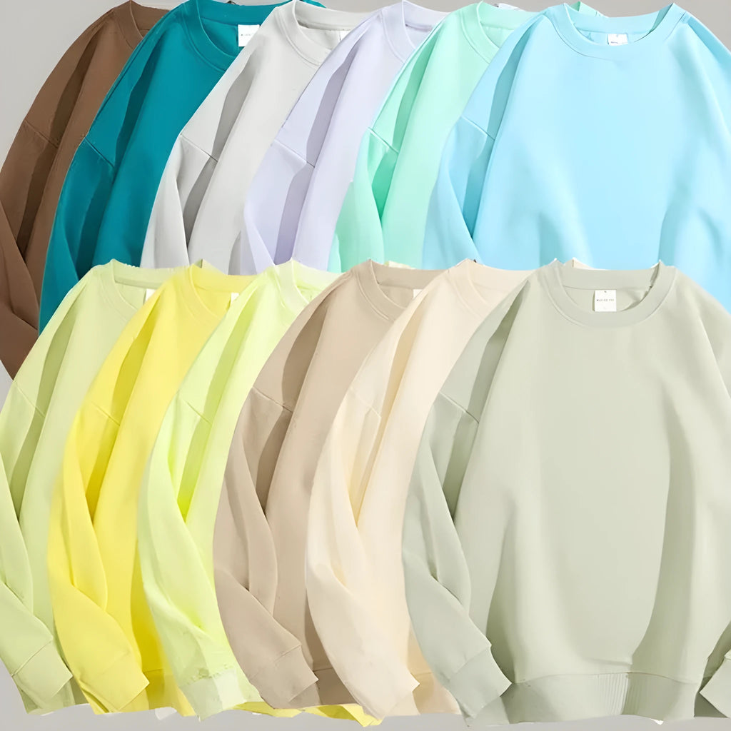 Cotton loose fit off shoulder sweater with round neck and long sleeves in various solid colours