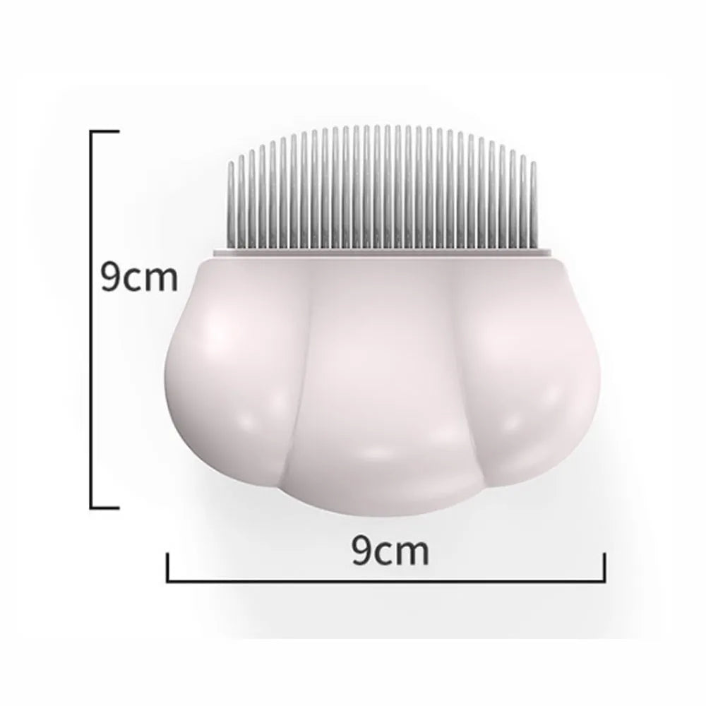 Paw Soft deshedding grooming brush for cats and dogs on a white background.