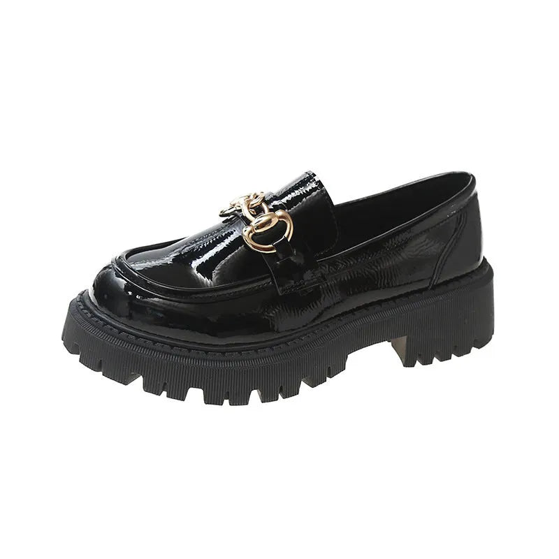 British retro round toe flat heel shoes for women in black glossy finish showing side view