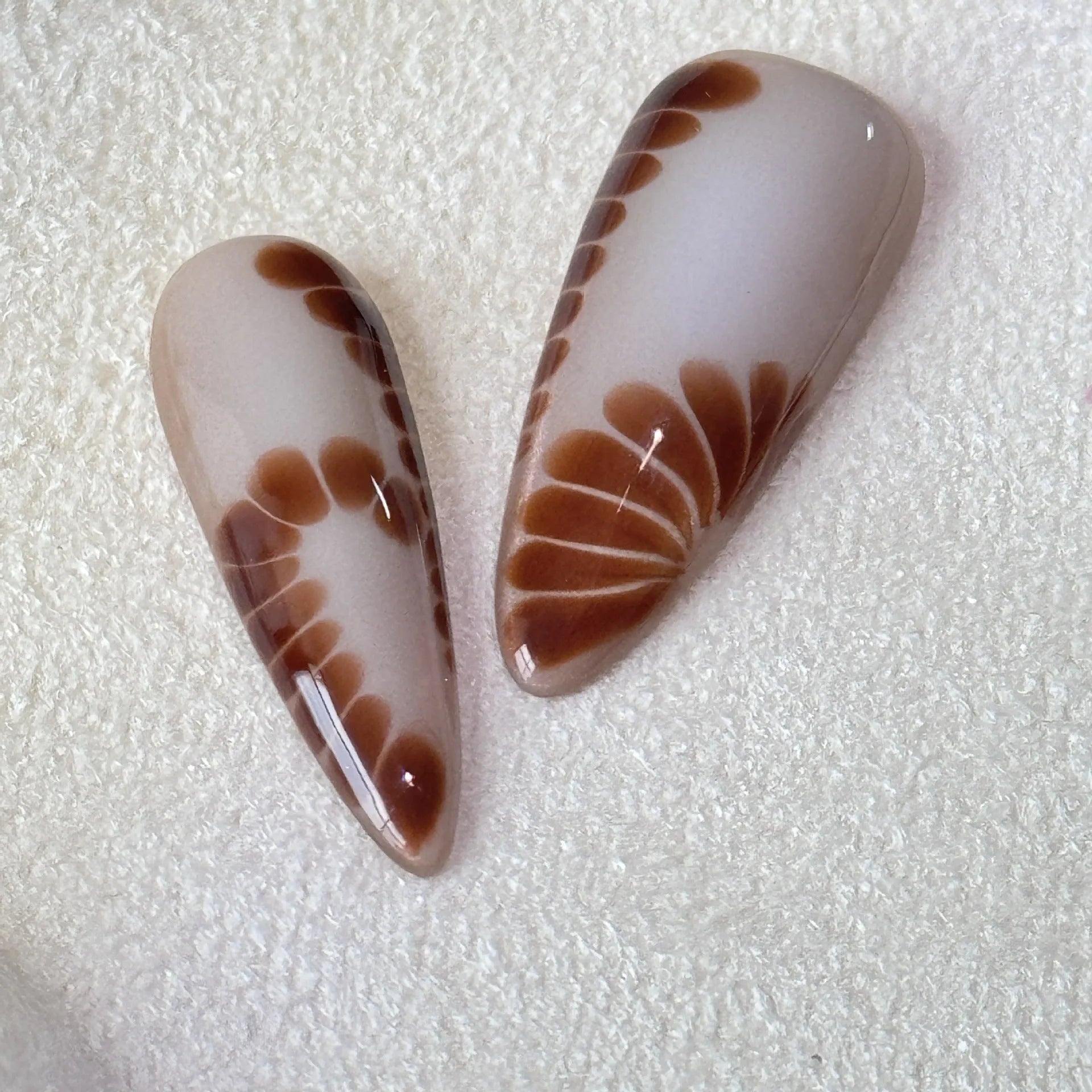 Handmade French style leopard print nail stickers with cross and flower patterns in long tip design available in sizes XS to L