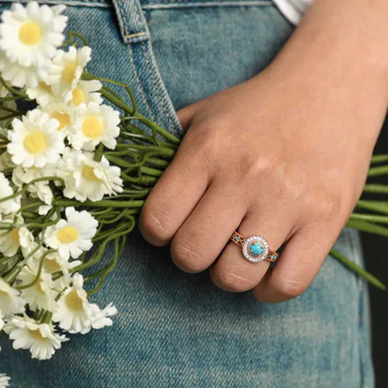Women's ethnic geometric ring with turquoise accents and rose gold finish on copper