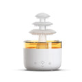 White plastic New Cloud Rain Air Humidifier with 500ml water tank and 7-colour atmosphere light on a wooden desk