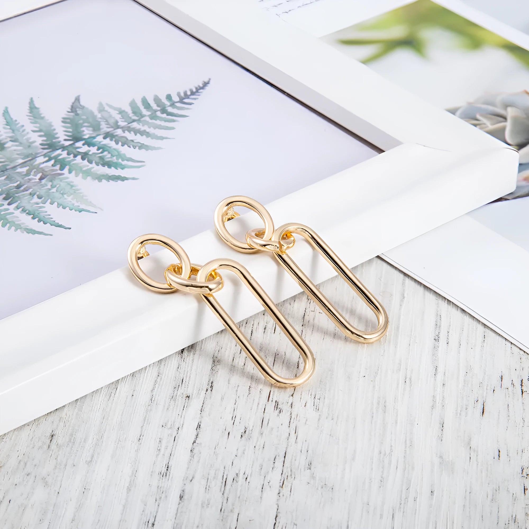 Geometric sterling silver needle coloured women's hoop earrings with ring and line design