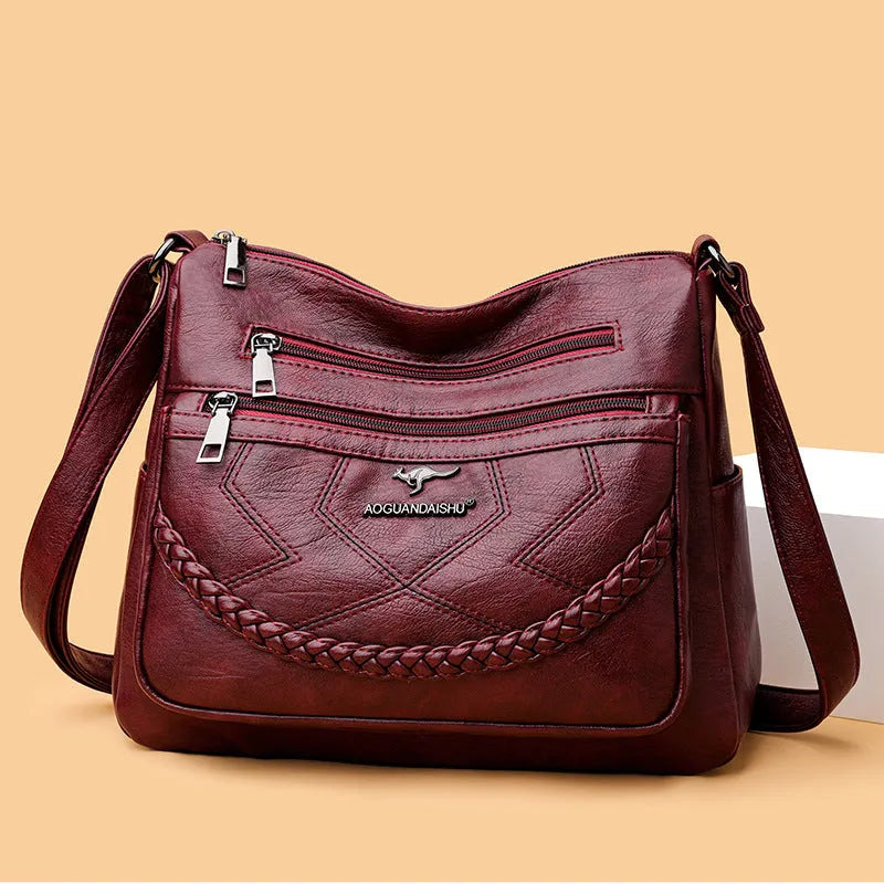 Soft leather large capacity shoulder bag in horizontal square shape with multiple compartments