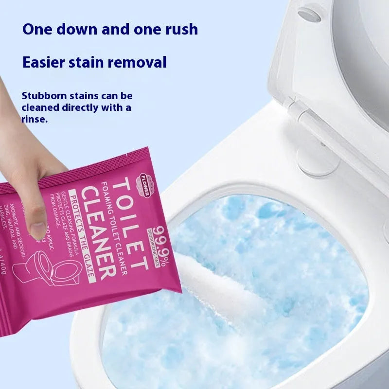 Box and bag of toilet cleaning bubble powder in blue and pink fragrances for descaling.