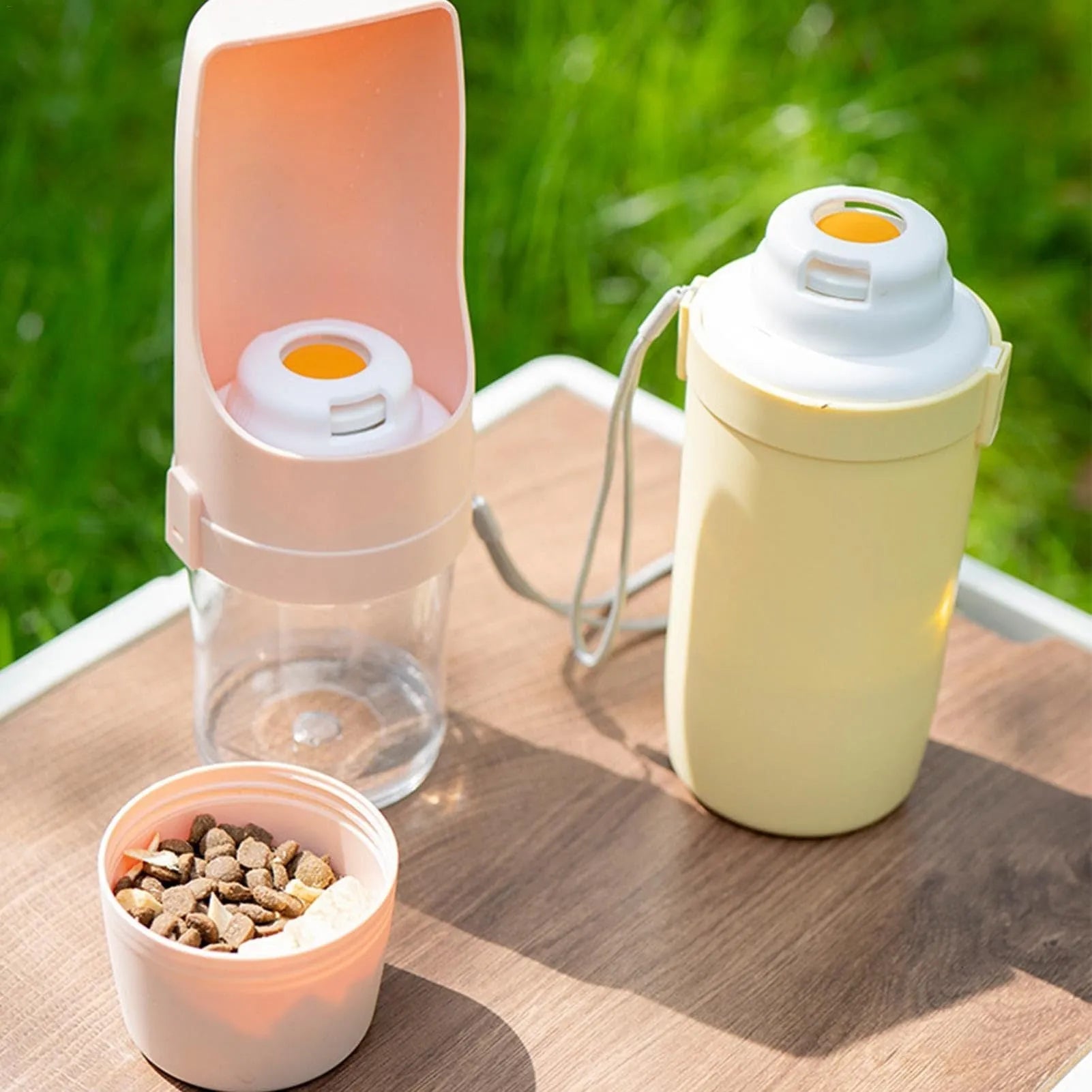 2-in-1 travel dog water bottle with 690ml capacity and lanyard, leakproof design for outdoor pet feeding
