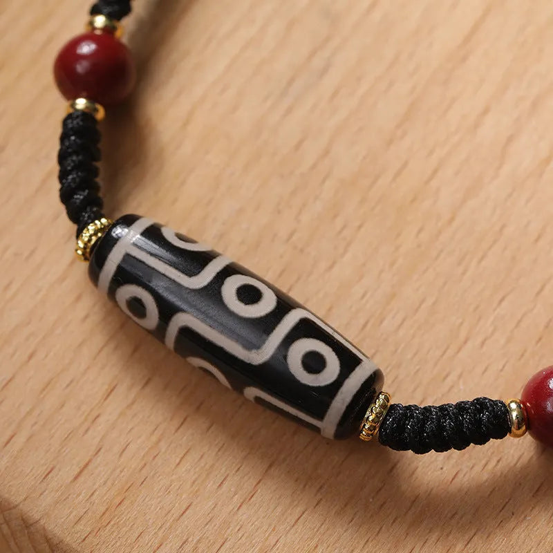 Tibetan agate dzi bead bracelet for men with shrinkable adjustable fit, showing 30 bead models on a neutral background