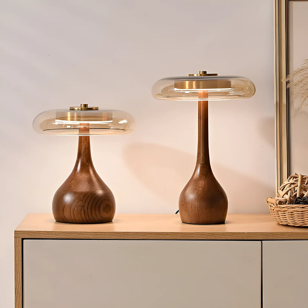 Solid ash wood bedside lamp with cognac shade and metal base on wooden table
