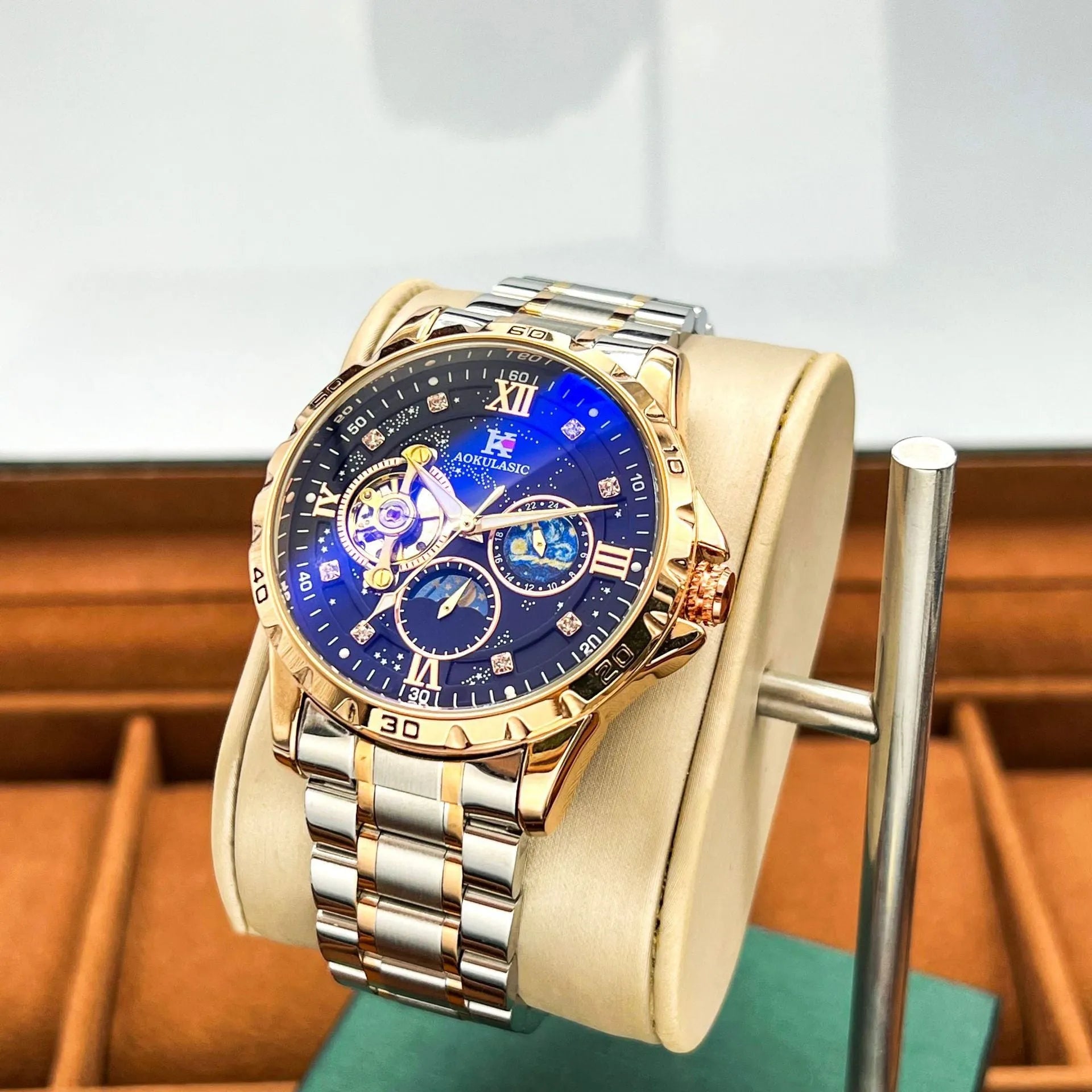 Men's automatic mechanical watch with rose gold shell and black dial showing 42mm diameter
