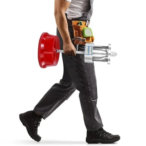 Portable manual hub balancer with aluminium head and bull's eye level on enamel base.