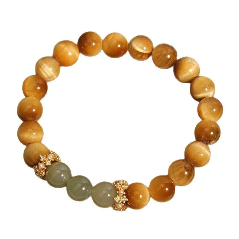 Natural tiger's eye and Hetian jade bracelet with diamond treatment showing golden gourd pattern