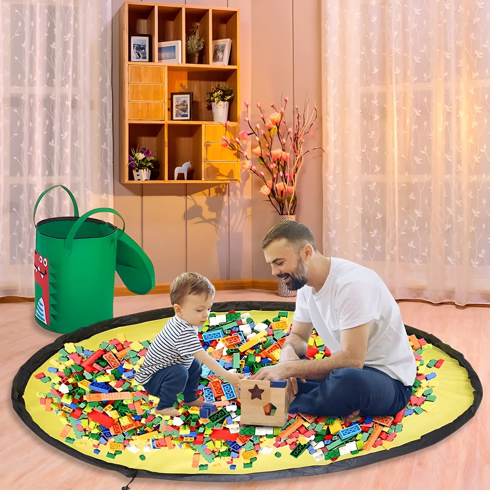 Green felt cube storage bag with pull rope, unfolded flat as a large rectangular play mat.