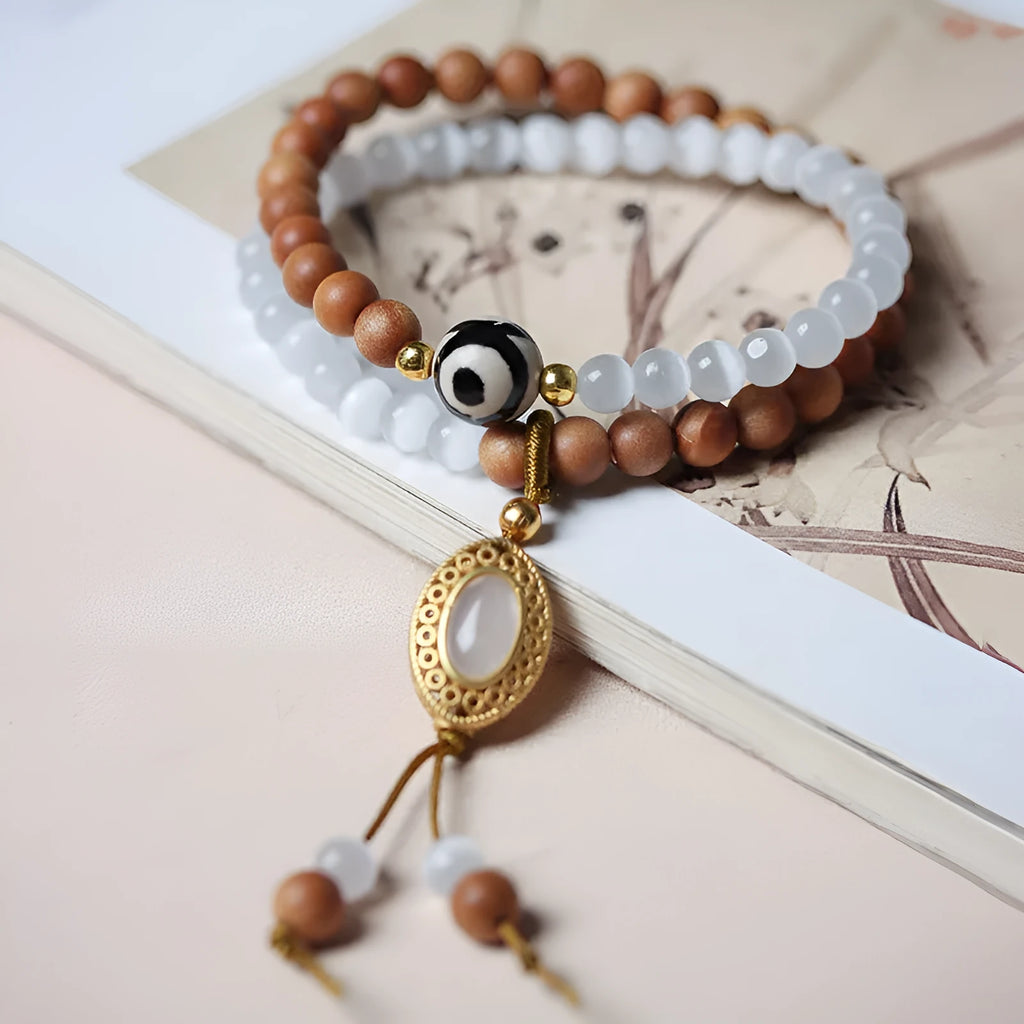 Barbie sandalwood double circle opal Tibetan bead bracelet with polished finish