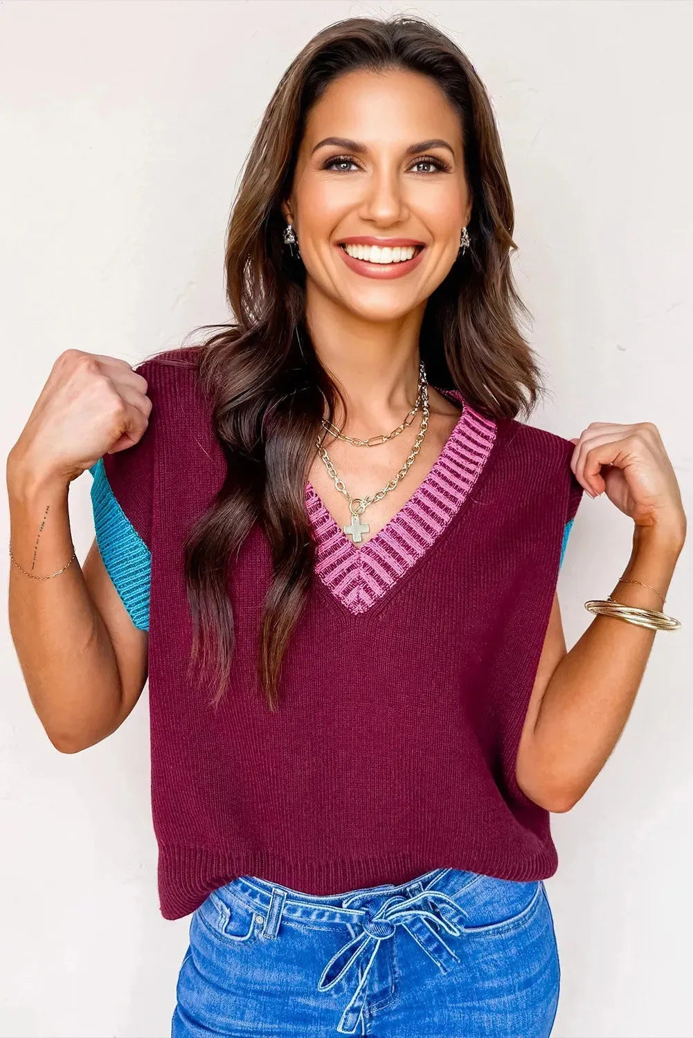 Burgundy women's loose V-neck sweater with contrast trim on cuffed short sleeves
