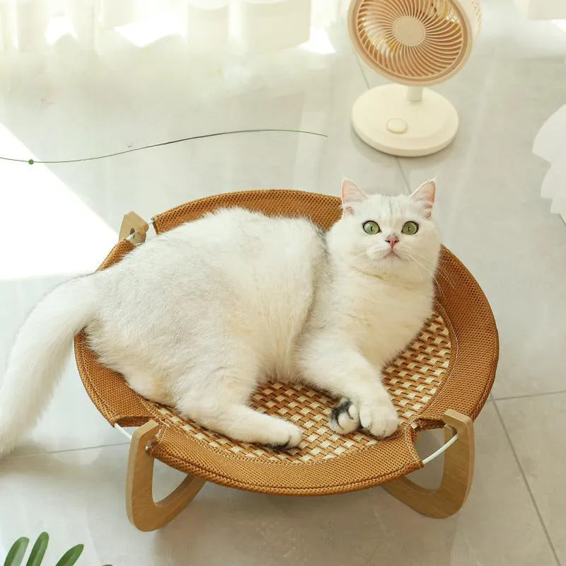 Brown woven rattan pet cooling bed hammock measuring 46cm square and 17.5cm high.