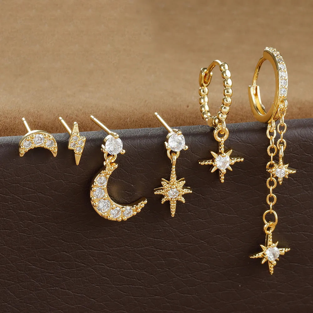 Six gold electroplated zircon stud earrings with chain tassel designs on copper base