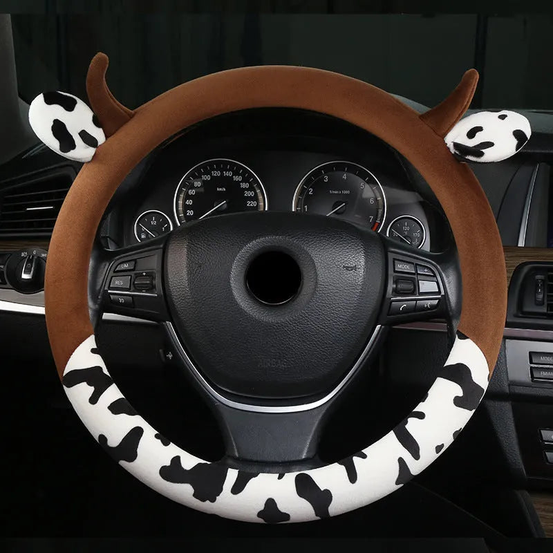 Short plush car steering wheel cover in coffee colour showing protective handle detail