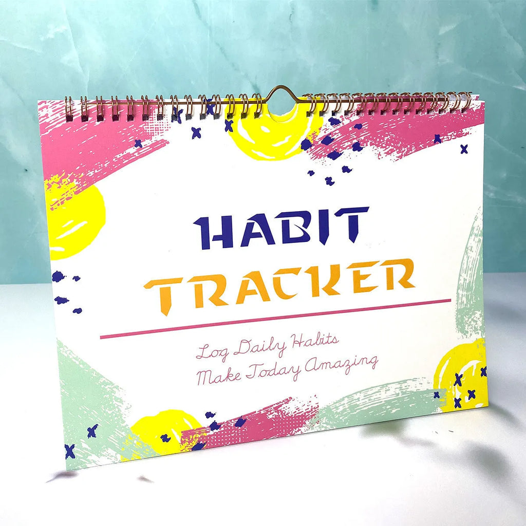 English habit tracking journal with 12 pages in 21cm by 28cm size, showing four colour options