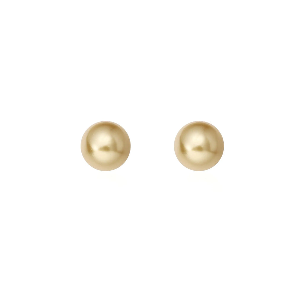 Geometric large pearl stud earrings with eight-point star design in silver setting.
