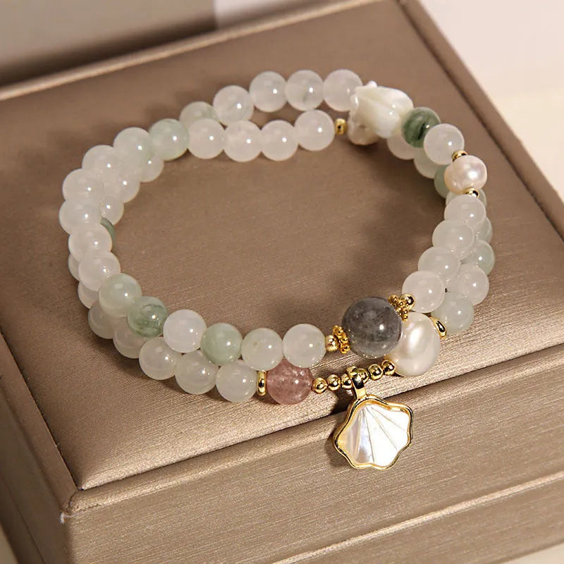 Women's crystal bracelet with Tianshan jade ginkgo leaf pendant and gold-plated setting
