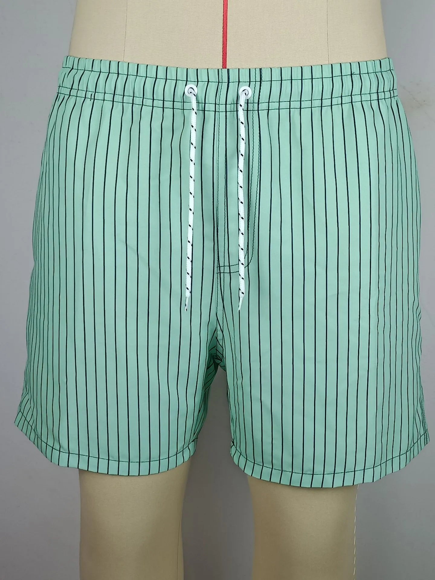 Striped polyester beach shorts with straight leg opening in navy blue grey khaki light blue colours