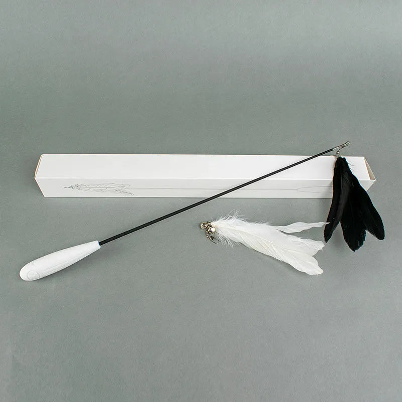 Telescopic cat fishing rod toy with self-hi bell and white goose feather lure on white shaft, extended for play