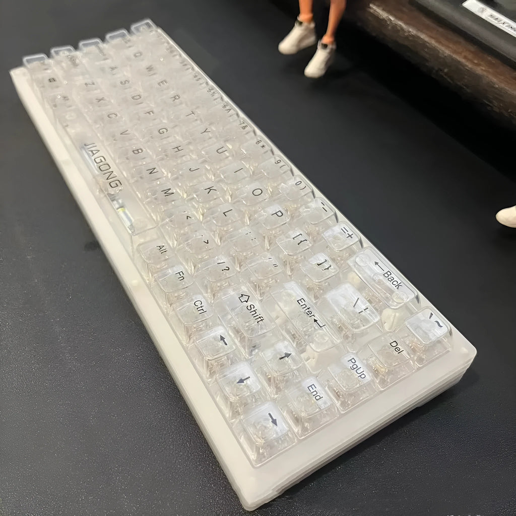132 transparent plastic mechanical keyboard key caps laid out in full set