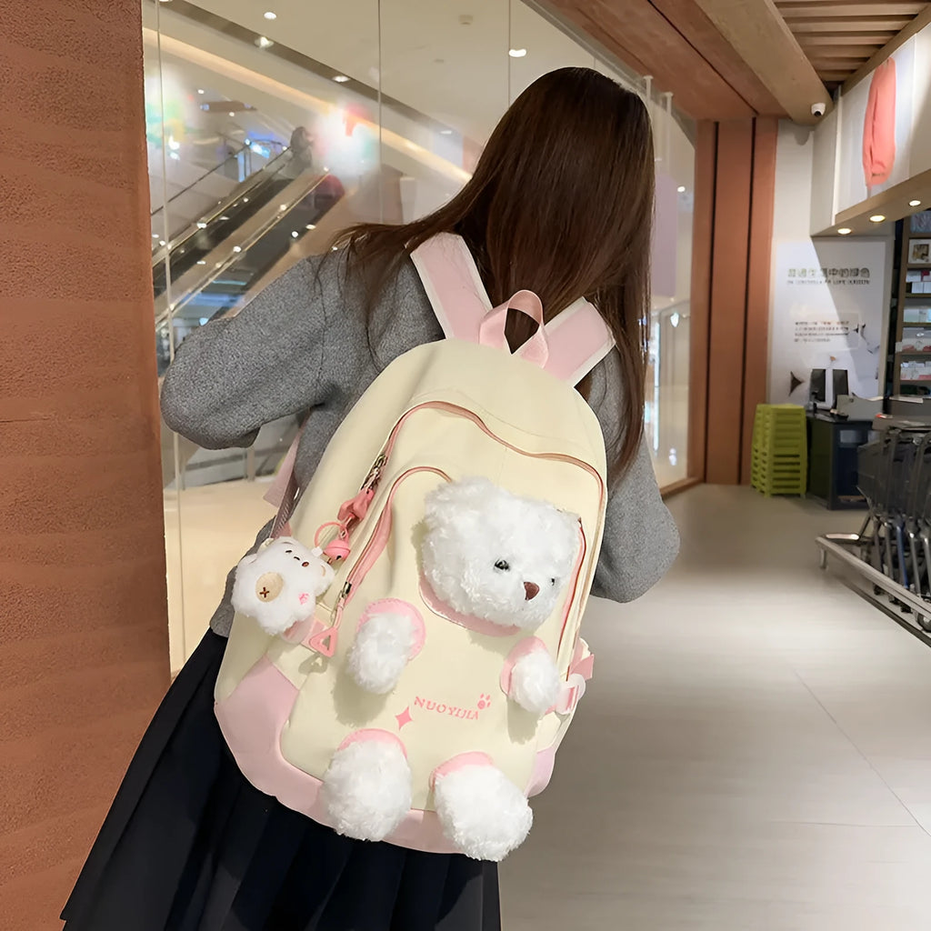 Cute Bear nylon schoolbag with curved shoulder straps, 20-35L capacity, in yellow pink colour