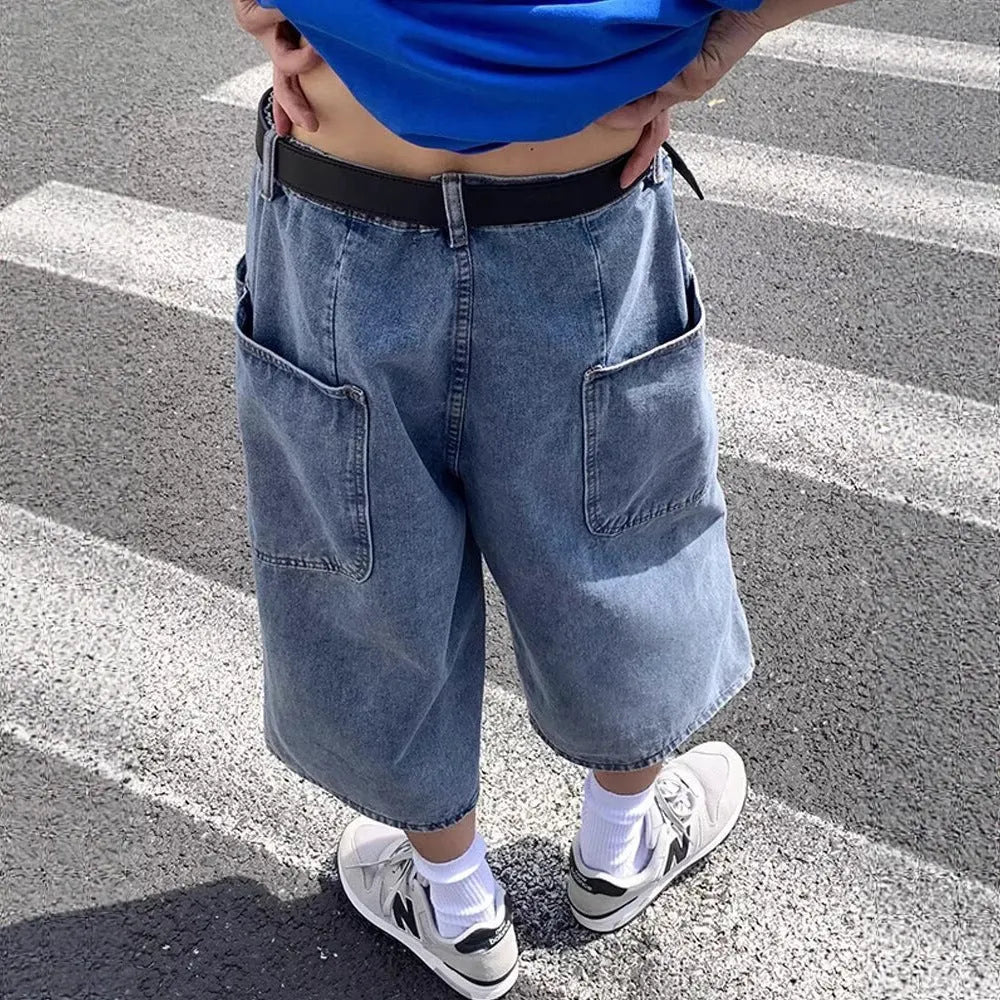 Men's high-waisted, cropped blue denim-style pirate shorts with a straight leg and zipper fly.