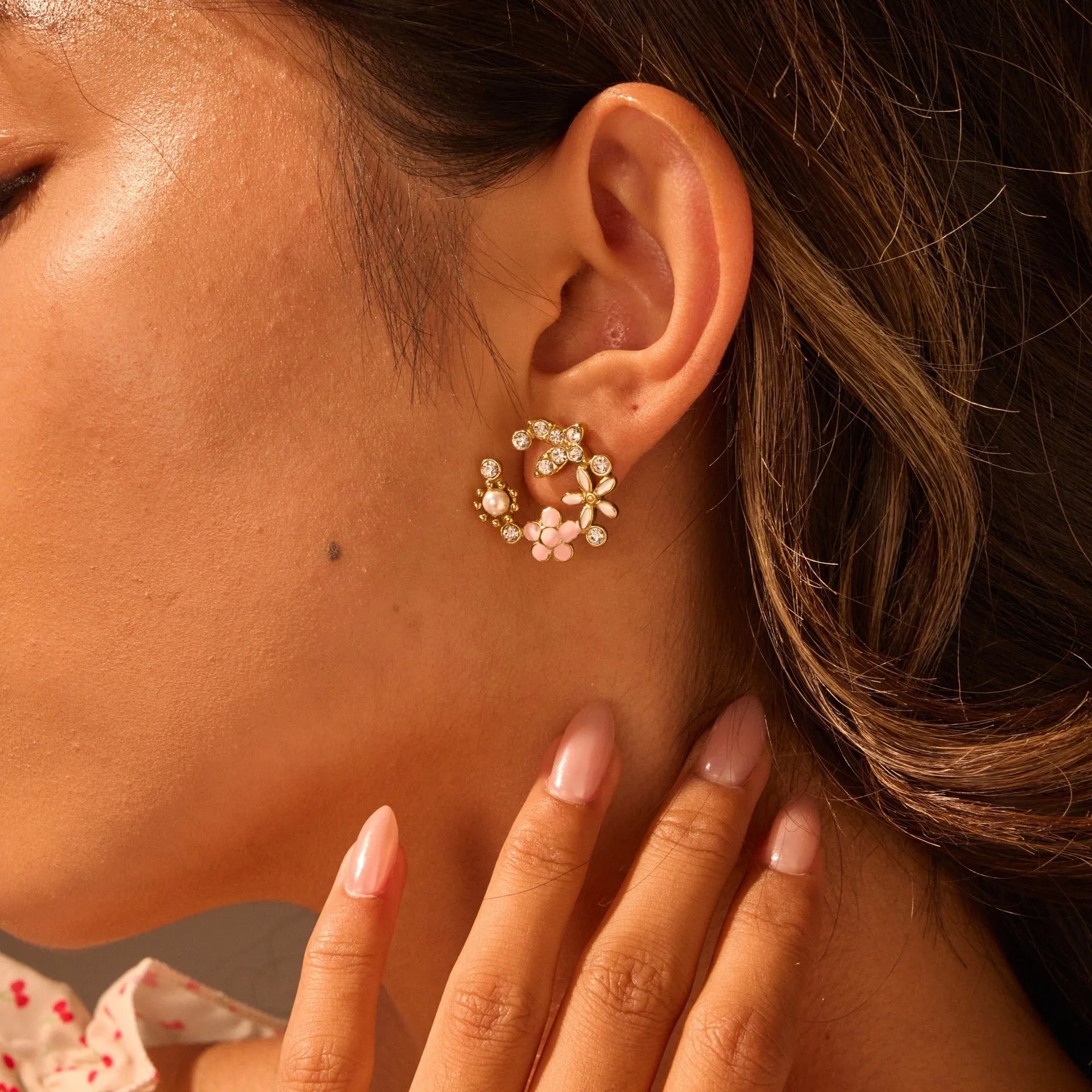 Gold plated flower stud earrings with colourful petal design on stainless steel