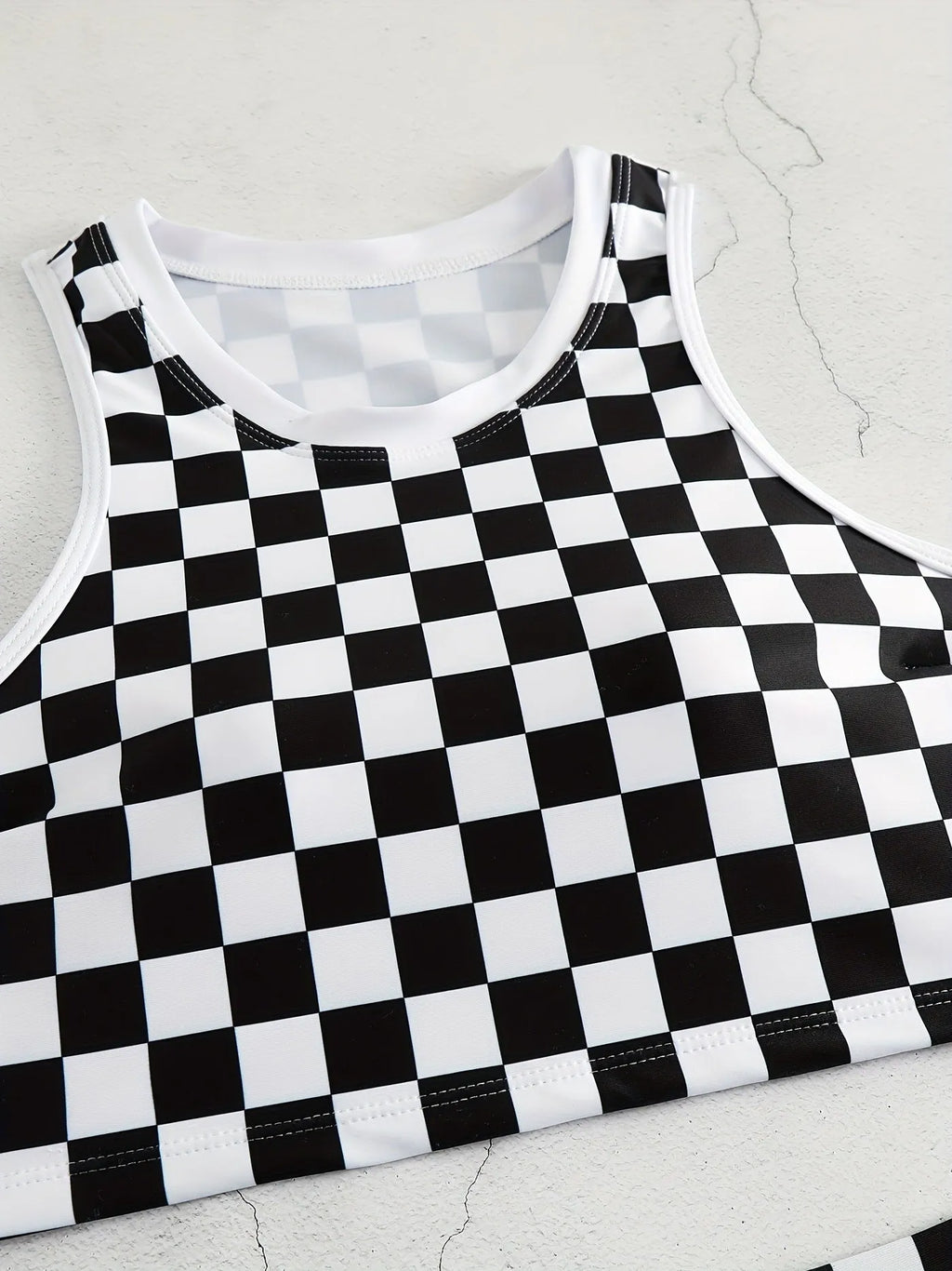 Racing one-piece swimsuit with suspender and backless in chessboard plaid pattern for women