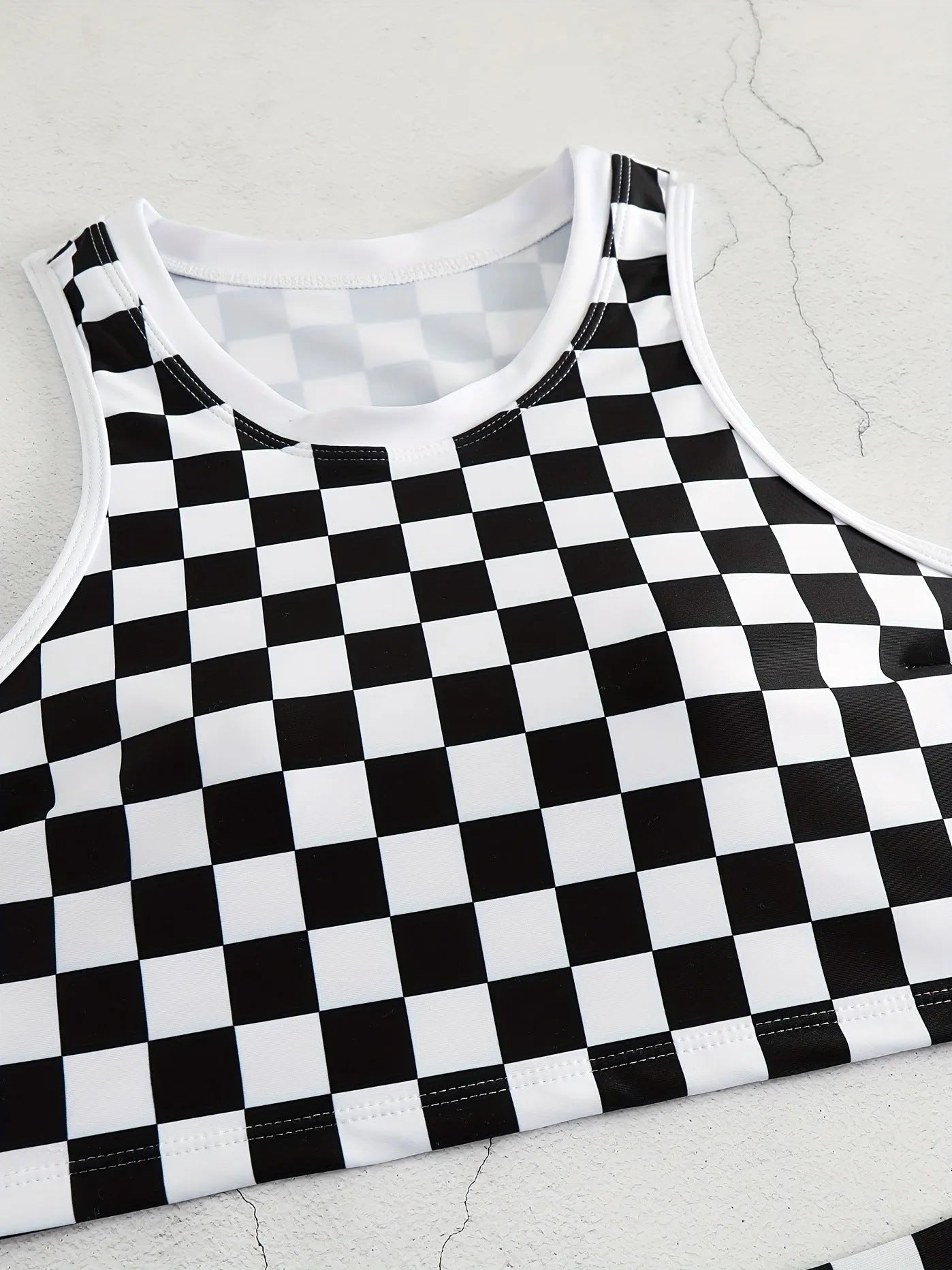 Racing one-piece swimsuit with suspender and backless in chessboard plaid pattern for women
