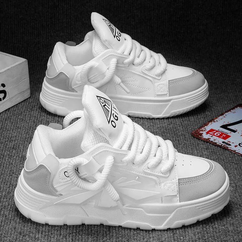 Men's white chunky platform sneakers with thick rubber sole and cartoon pattern on synthetic leather upper.